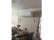 Another room in the house, with a wall-mounted air conditioner at 2060 N Center St # 282, Mesa, AZ 85201