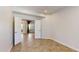 Bedroom features double doors to the living area; tile floors and fresh neutral paint at 21320 N 56Th St # 1158, Phoenix, AZ 85054