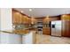 Spacious kitchen with granite countertops, tile floors and stainless steel appliances at 21320 N 56Th St # 1158, Phoenix, AZ 85054