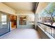 Covered patio with railing, view of building exterior, and sliding glass door at 21320 N 56Th St # 1158, Phoenix, AZ 85054