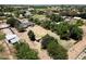 Real estate showing aerial view, expansive property with mature trees and outbuildings at 23265 S Via Del Arroyo --, Queen Creek, AZ 85142