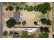 Scenic property featuring an expansive yard, accented with mature trees and diverse landscape elements at 23265 S Via Del Arroyo --, Queen Creek, AZ 85142