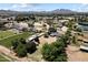 Scenic aerial view of the property showcasing the surrounding neighborhood and mountain views at 23265 S Via Del Arroyo --, Queen Creek, AZ 85142