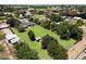 Picturesque aerial shot of a property featuring a large yard, mature trees, and diverse landscaping at 23265 S Via Del Arroyo --, Queen Creek, AZ 85142