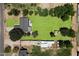 Stunning property with expansive green lawn, scattered trees, and diverse landscape elements at 23265 S Via Del Arroyo --, Queen Creek, AZ 85142