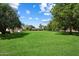 Spacious backyard with mature trees, plenty of room to roam, and a shed at 23265 S Via Del Arroyo --, Queen Creek, AZ 85142