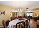 Charming dining room with chandelier and ample space for entertaining at 23265 S Via Del Arroyo --, Queen Creek, AZ 85142