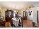 Elegant dining room with a chandelier and classic decor at 23265 S Via Del Arroyo --, Queen Creek, AZ 85142