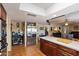 Open concept kitchen with stainless steel appliances and granite countertops at 23265 S Via Del Arroyo --, Queen Creek, AZ 85142