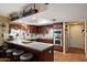 Modern kitchen with stainless steel appliances, breakfast bar, and ample counter space at 23265 S Via Del Arroyo --, Queen Creek, AZ 85142