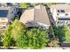Aerial view of a well-maintained home featuring a tile roof and mature landscaping at 2567 E San Isido Trl, Casa Grande, AZ 85194