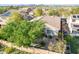 Backyard view of home with mature trees and desert landscaping with a block wall surround at 2567 E San Isido Trl, Casa Grande, AZ 85194