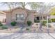 Attractive house showing a desert landscaped yard with trees, gravel, and shrubs at 2567 E San Isido Trl, Casa Grande, AZ 85194