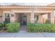 Welcoming home featuring a quaint covered porch and manicured front yard landscaping at 2567 E San Isido Trl, Casa Grande, AZ 85194