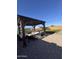Outdoor gazebo with seating and lights for enjoying evenings in the backyard at 25968 W Tina Ln, Buckeye, AZ 85396