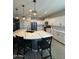 Bright kitchen with quartz countertops, stainless steel appliances, and a functional layout at 25968 W Tina Ln, Buckeye, AZ 85396