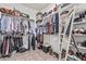 Spacious walk-in closet with ample hanging and shelving space for organization at 26264 N 74Th Ln, Peoria, AZ 85383