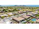 Aerial view shows well-maintained yards and desert landscaping in this neighborhood community at 27562 N 99Th Dr, Peoria, AZ 85383