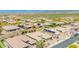 Aerial view showcases the community's landscaping and well-maintained homes at 27562 N 99Th Dr, Peoria, AZ 85383