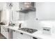 Close up on a kitchen offering stainless steel appliances and contrasting countertops at 27562 N 99Th Dr, Peoria, AZ 85383