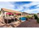 Outdoor living space featuring a private pool, spa, and putting green perfect for relaxation and recreation at 29816 N 51St Pl, Cave Creek, AZ 85331