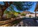 Beautiful backyard, surrounded with lush greenery, with view of the pool, perfect for entertaining at 3018 W Country Club Ter, Phoenix, AZ 85027