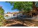 Inviting backyard pool surrounded by lush greenery and a patio area, perfect for relaxation and outdoor entertaining at 3018 W Country Club Ter, Phoenix, AZ 85027