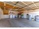 Spacious garage interior with laundry area, storage, and ample room for parking at 3018 W Country Club Ter, Phoenix, AZ 85027