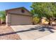 Spacious two-car garage and driveway offer ample parking for residents and guests alike at 3018 W Country Club Ter, Phoenix, AZ 85027