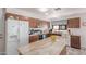 Well-equipped kitchen features a large island, stainless steel appliances, and plenty of counter space at 3018 W Country Club Ter, Phoenix, AZ 85027