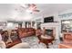 Cozy living room features a fireplace, perfect for relaxing evenings and entertaining guests at 3018 W Country Club Ter, Phoenix, AZ 85027