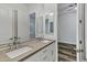 Bathroom featuring double sinks with light countertops and modern fixtures at 3038 E Longhorn Dr, Gilbert, AZ 85297
