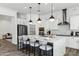 Gourmet kitchen with a large center island, stainless steel appliances, and ample counter space at 3038 E Longhorn Dr, Gilbert, AZ 85297