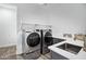 Bright laundry room with stainless steel appliances and counter space at 3038 E Longhorn Dr, Gilbert, AZ 85297