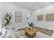 Comfortable living room with modern decor, neutral colors, and bright lighting at 3038 E Longhorn Dr, Gilbert, AZ 85297