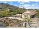 Expansive property featuring mature landscaping, a private courtyard, and views of the surrounding mountains at 34611 N Sunset Trl, Cave Creek, AZ 85331