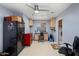 Spacious garage with laundry area, desk, and storage, offering functionality and convenience at 34611 N Sunset Trl, Cave Creek, AZ 85331