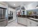Well-appointed kitchen features stainless steel appliances and ample cabinet space at 34611 N Sunset Trl, Cave Creek, AZ 85331