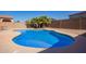 Backyard features a refreshing pool perfect for summer days and outdoor fun at 36179 W Cartegna Ln, Maricopa, AZ 85138