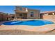 Backyard pool with patio area, perfect for outdoor relaxation and entertaining at 36179 W Cartegna Ln, Maricopa, AZ 85138