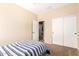 Cozy bedroom with closet and neutral walls, perfect for creating your personal oasis at 36179 W Cartegna Ln, Maricopa, AZ 85138
