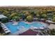 Large community pool with plenty of lounge chairs, umbrellas, and a separate area at 3817 E Patrick Ln, Phoenix, AZ 85050