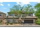 Charming two-story home featuring desert landscaping, a tile roof, and a spacious two-car garage at 3817 E Patrick Ln, Phoenix, AZ 85050