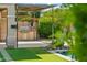 A built-in outdoor kitchen with grill and stainless steel access door is perfect for entertaining guests at 3817 E Patrick Ln, Phoenix, AZ 85050
