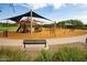 Fun playground with multiple play structures and shaded areas for a safe and enjoyable experience at 3817 E Patrick Ln, Phoenix, AZ 85050