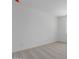 Bright bedroom featuring neutral carpet and white walls at 40595 W Michaels Dr, Maricopa, AZ 85138
