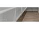 Walk-in pantry with custom shelves and tile flooring offers ample storage space at 40595 W Michaels Dr, Maricopa, AZ 85138