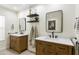 Well-lit bathroom featuring dual vanities, modern fixtures, and stylish decor at 4137 W Cielo Grande --, Glendale, AZ 85310