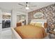 This bedroom features stylish decor, a mirrored closet, and a convenient in-room washer/dryer at 4137 W Cielo Grande --, Glendale, AZ 85310