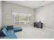 Bonus room featuring a projector, large window, and modular sofa couch at 4137 W Cielo Grande --, Glendale, AZ 85310